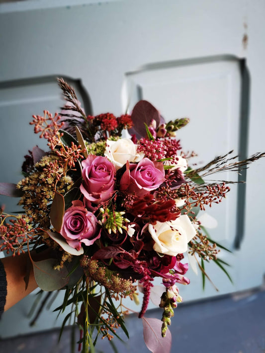 Purple flowers and roses