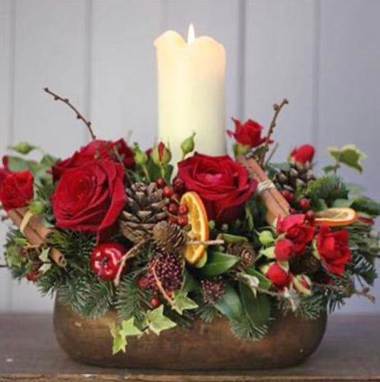 Christmas Arrangement with Red Roses and a Candle